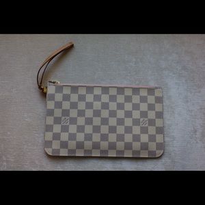 Louis Vuitton neverfull wrist wallet.